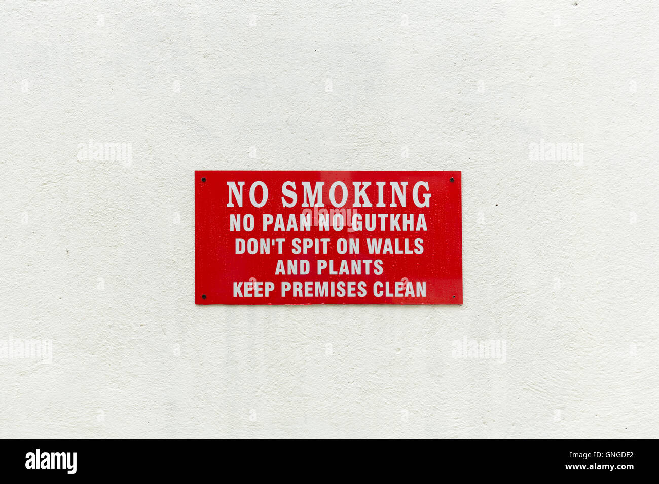 No Smoking Sign with white background wall Stock Photo