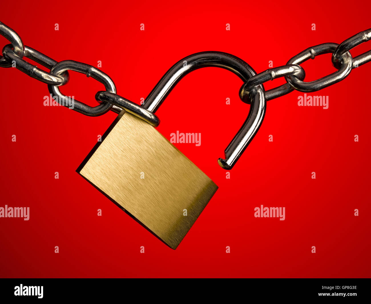 Padlock and chain on red Stock Photo