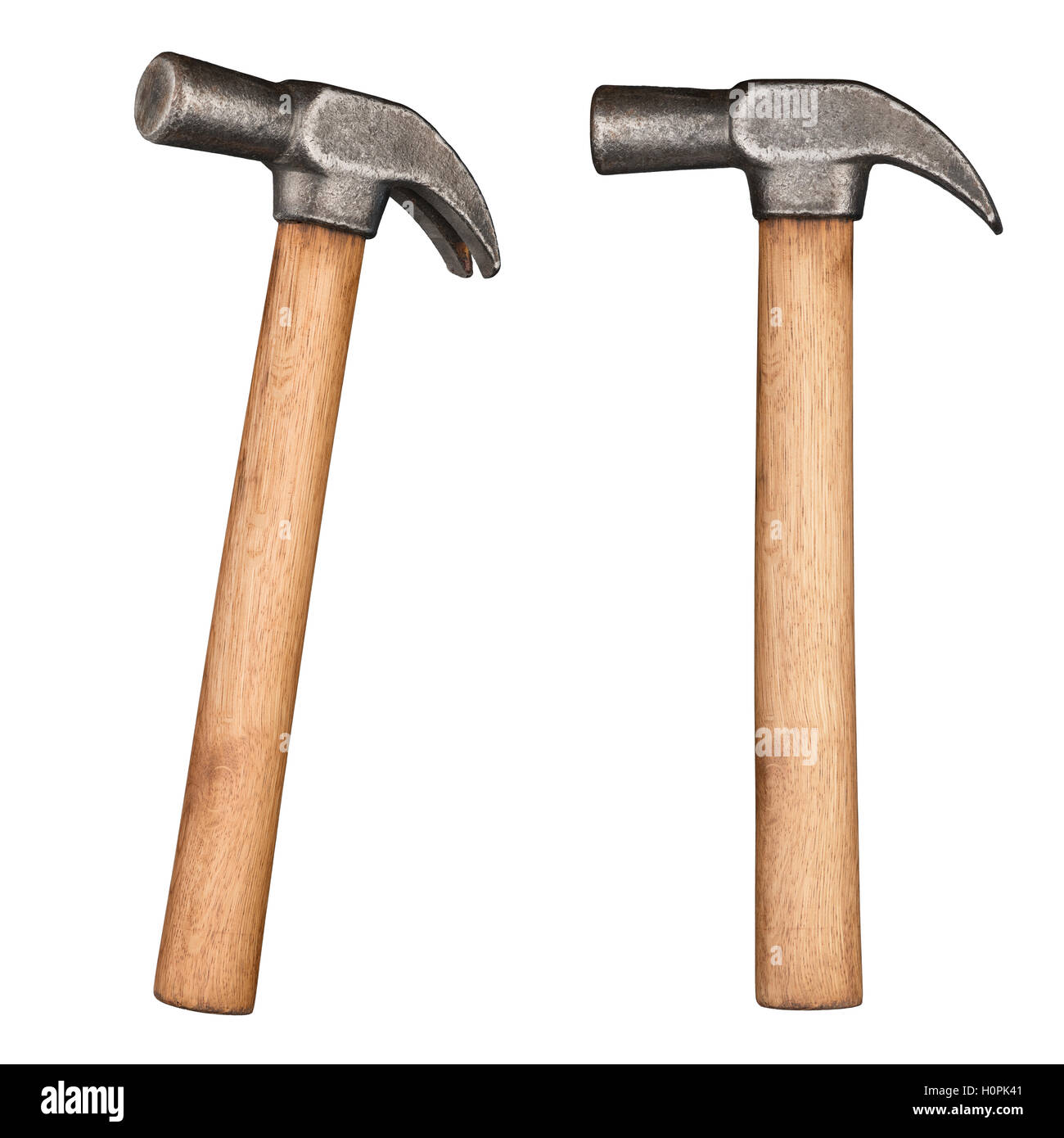 Old rustic claw hammer with wooden handle. Stock Photo