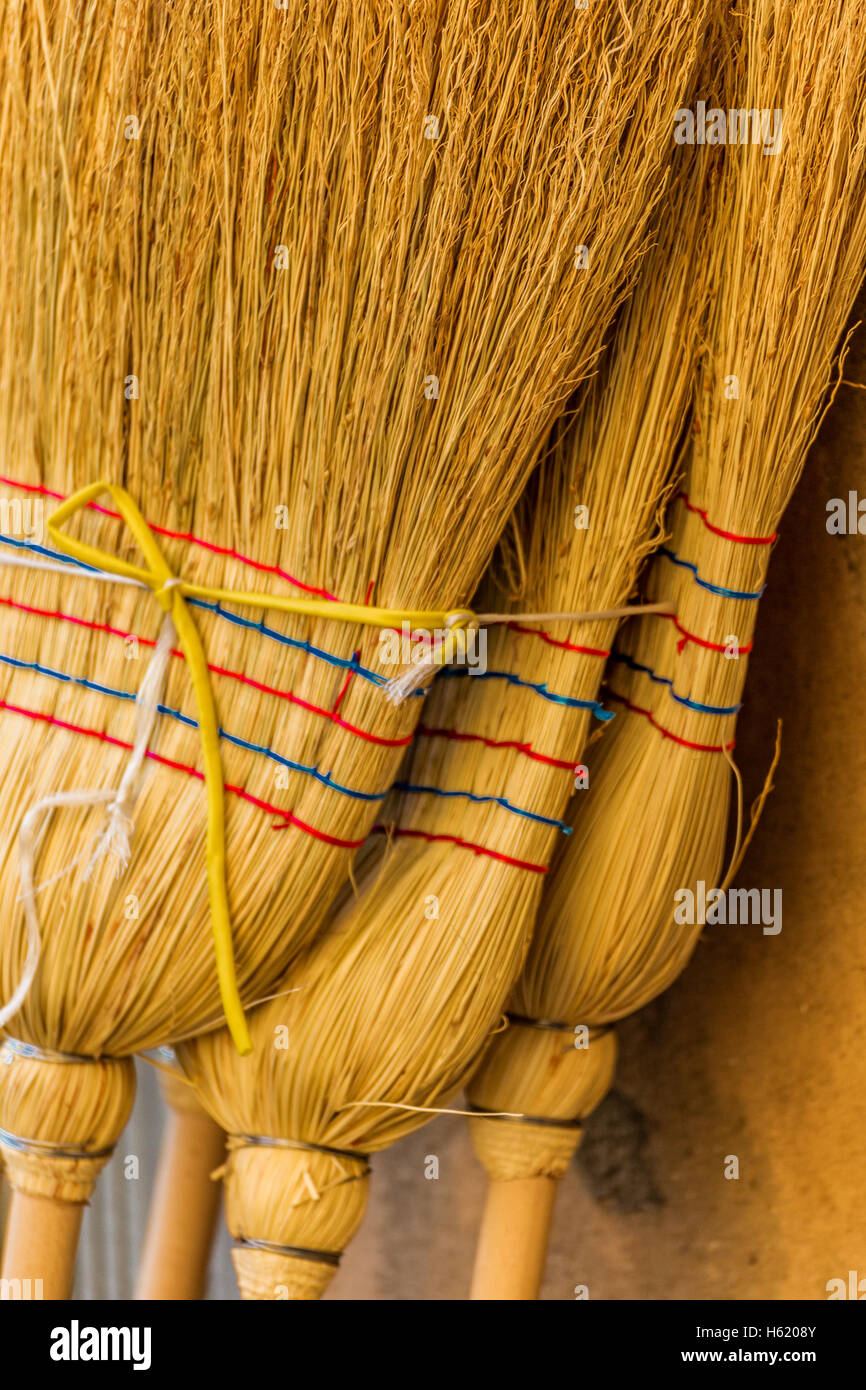 Closeup of brooms Stock Photo