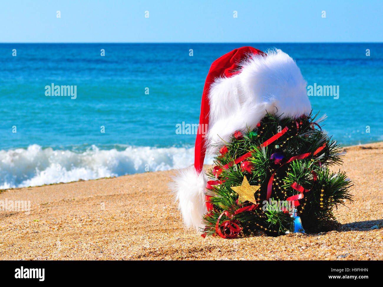 christmas tree on beach Stock Photo