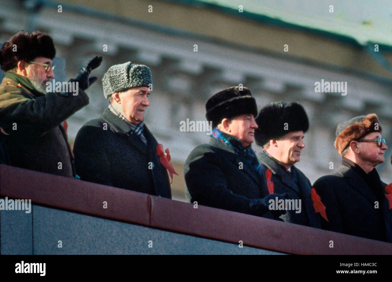 Nov 07, 1987 - Moscow, Russia - (left to right) FIDEL CASTRO, President of Cuba and First Secretary of the Cuban Communist Party waving, ANDREI GROMYKO, Minister of Foreign Affairs of the USSR, MIKHAIL GORBACHEV, General Secretary of the Communist Party of the Soviet Union, NIKOLAI RYZHKOV, Chairman of the Council of Ministers of the USSR and WOJCIECH JARUZELSKI, Prime Minister of Poland and First Secretary of the Central Committee of the Polish United Workers Party atop Lenin's Tomb in Moscow's Red Square, reviewing the parade celebrating the 70th Anniversary of the October Socialist Revoluti Stock Photo