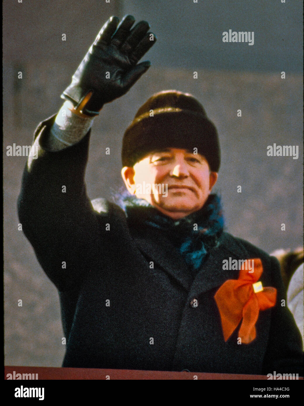 Nov. 07, 1987 - Moscow, Central Federal District, Russia - MIKHAIL GORBACHEV, General Secretary of the Communist Party of the Soviet Union, atop Lenin' s Tomb in Moscow's Red Square, waving as he reviews the parade celebrating the 70th Anniversary of the October Socialist Revolution. .(Credit Image: © Arnold Drapkin/ZUMAPRESS.com) Stock Photo