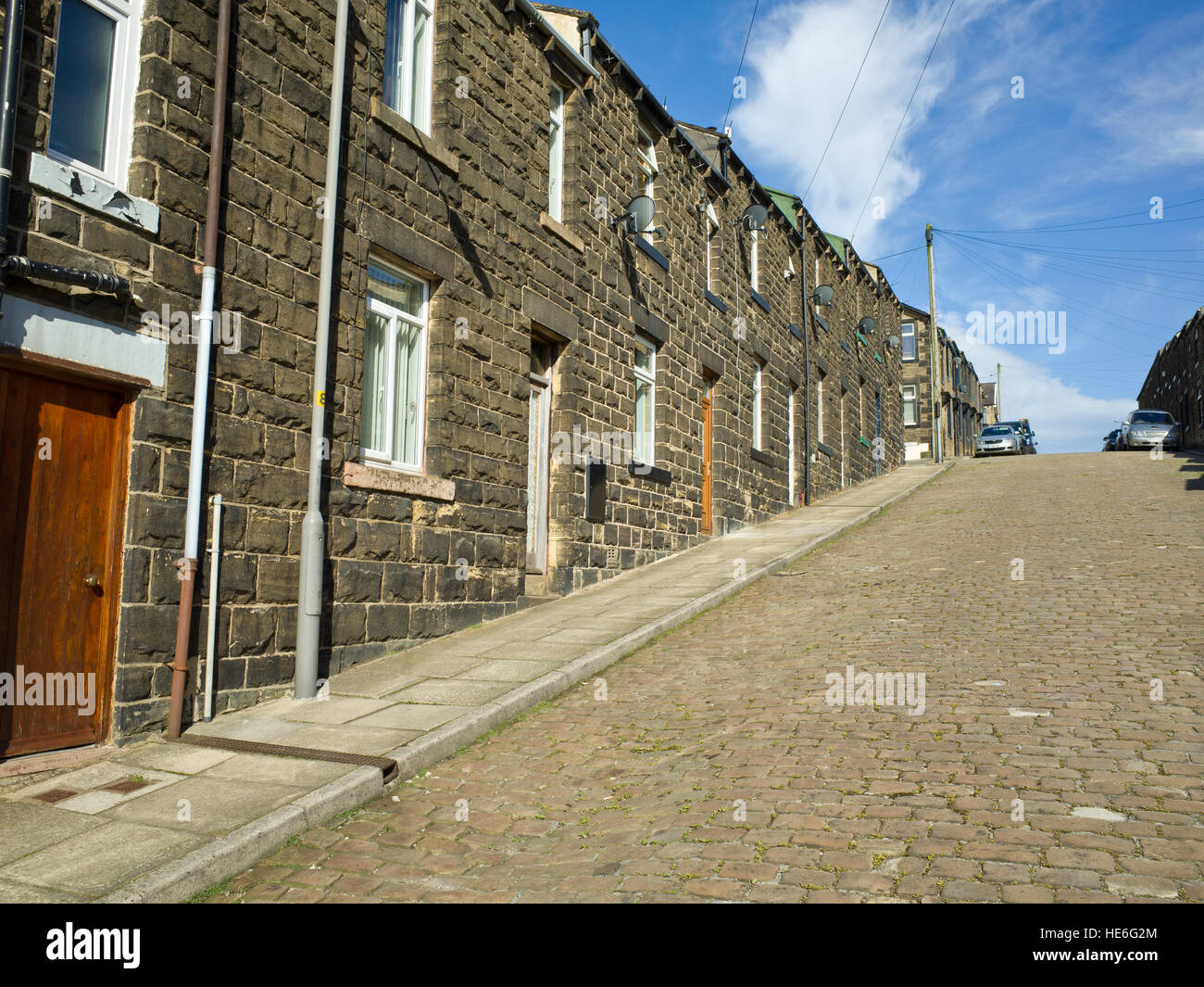 Terraced Houses on Steep Hill UK Skipton Yorkshire Dales Stock Photo