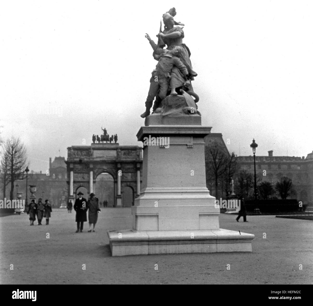 The Tuileries statues monument and Arc de Triomphe du Carrousel in Paris, France 1926 Stock Photo