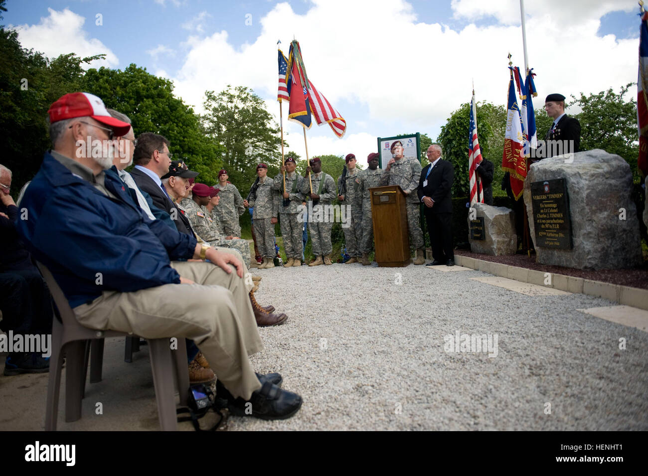 Col. Trevor J. Bredenkamp commander of 1st Brigade Combat Team, 82nd Airborne Division, speaks to attendees during a ceremony held here June 4 commemorating Lt. Col. Charles J. Timmes, the commander of 2nd Battalion, 507th Parachute Infantry Regiment, 82nd Airborne Division, during the invasion of Normandy who landed in an orchard during the invasion of Normandy and held his position for three days before being able to evade the enemy. The event was one of several commemorations of the 70th Anniversary of D-Day operations conducted by the Allies during WWII, June 6, 1944. Task Force Normandy,  Stock Photo