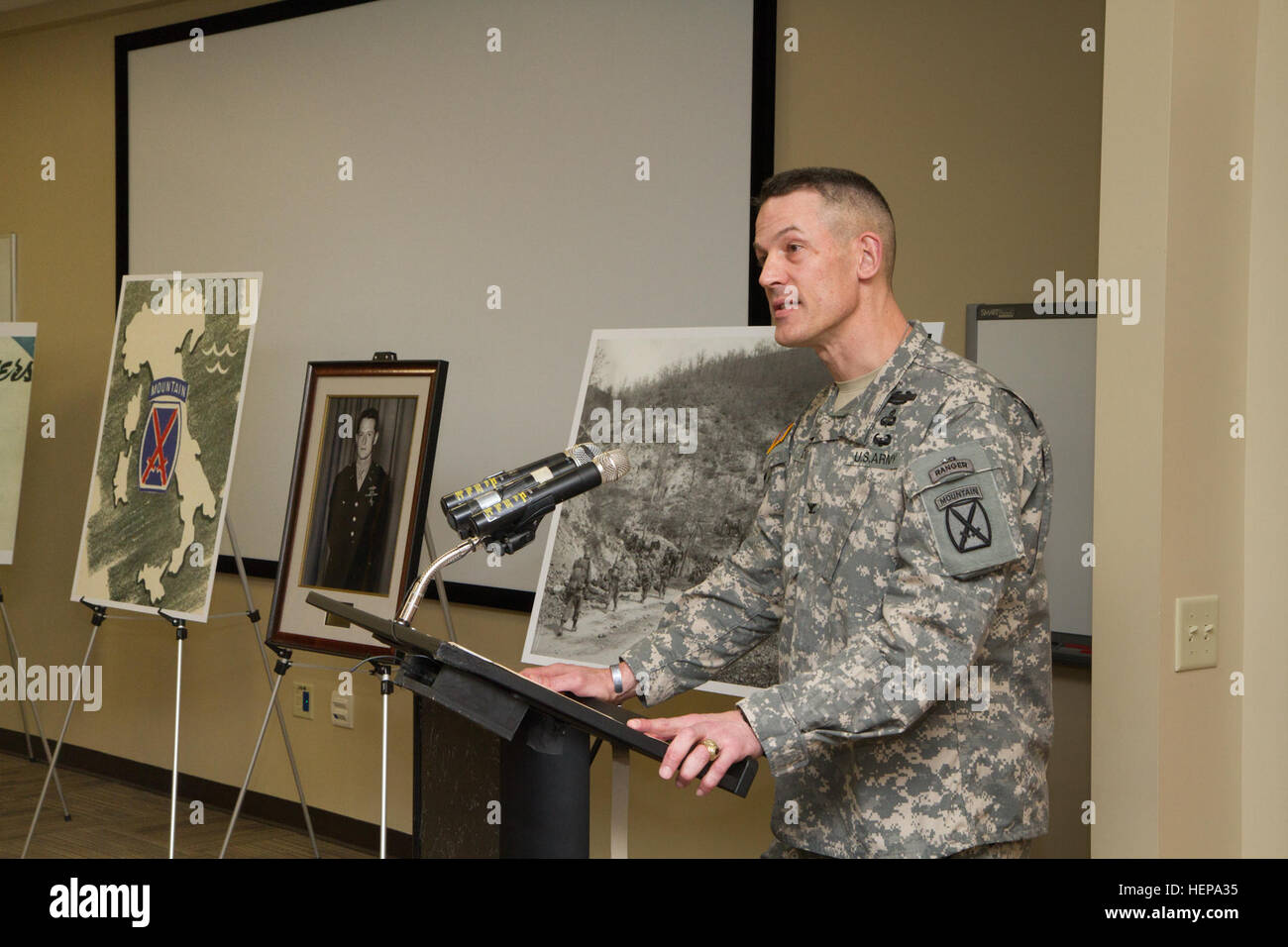 Col. David S. Doyle, commander of 2nd Brigade Combat Team, 10th Mountain Division (Light Infantry), speaks during  memorialization ceremony at the 1st Lt. John S. Creaghe Training Support Center in Fort Drum, N.Y. Creaghe served in the 10th Mountain Division during WWII, and was awarded the Distinguished Service Cross, the Silver Star, the Bronze Star and the Purple Heart for his actions during the battle on Mt. Della Spe, Apennine Mountain Range, Italy. “Lt. Creaghe represents the greatest generation of Americans who answered the call to fight for a better world,” Doyle said. “These men and w Stock Photo