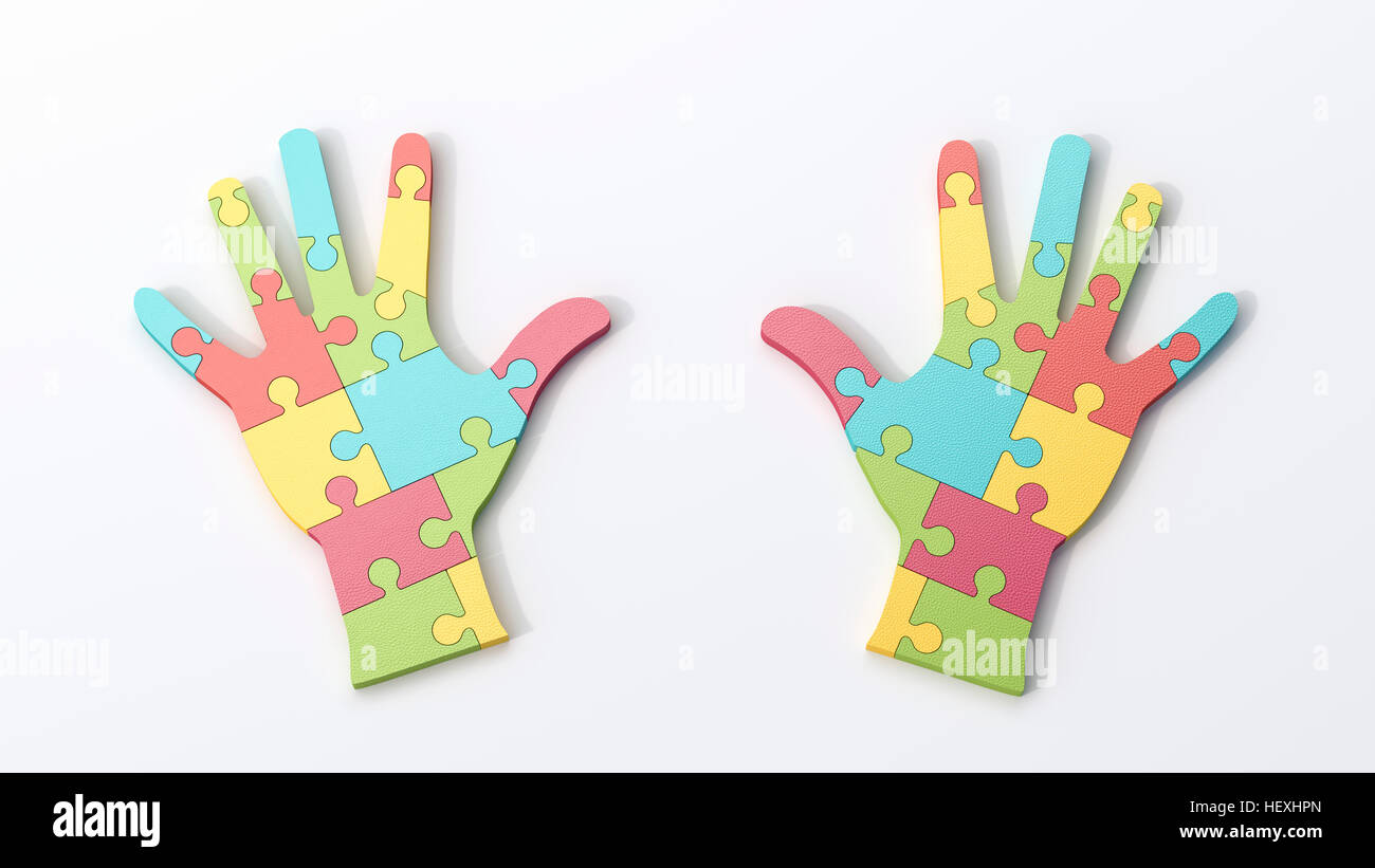 Two multicolored puzzle hands Stock Photo