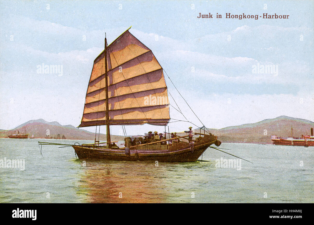 Chinese Junk in Hong Kong Bay. Stock Photo