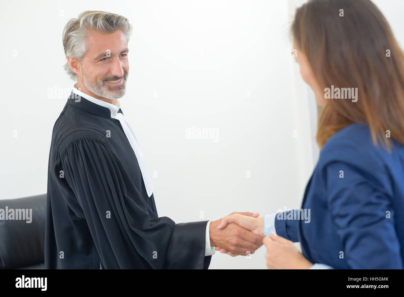 judge shaking hands Stock Photo