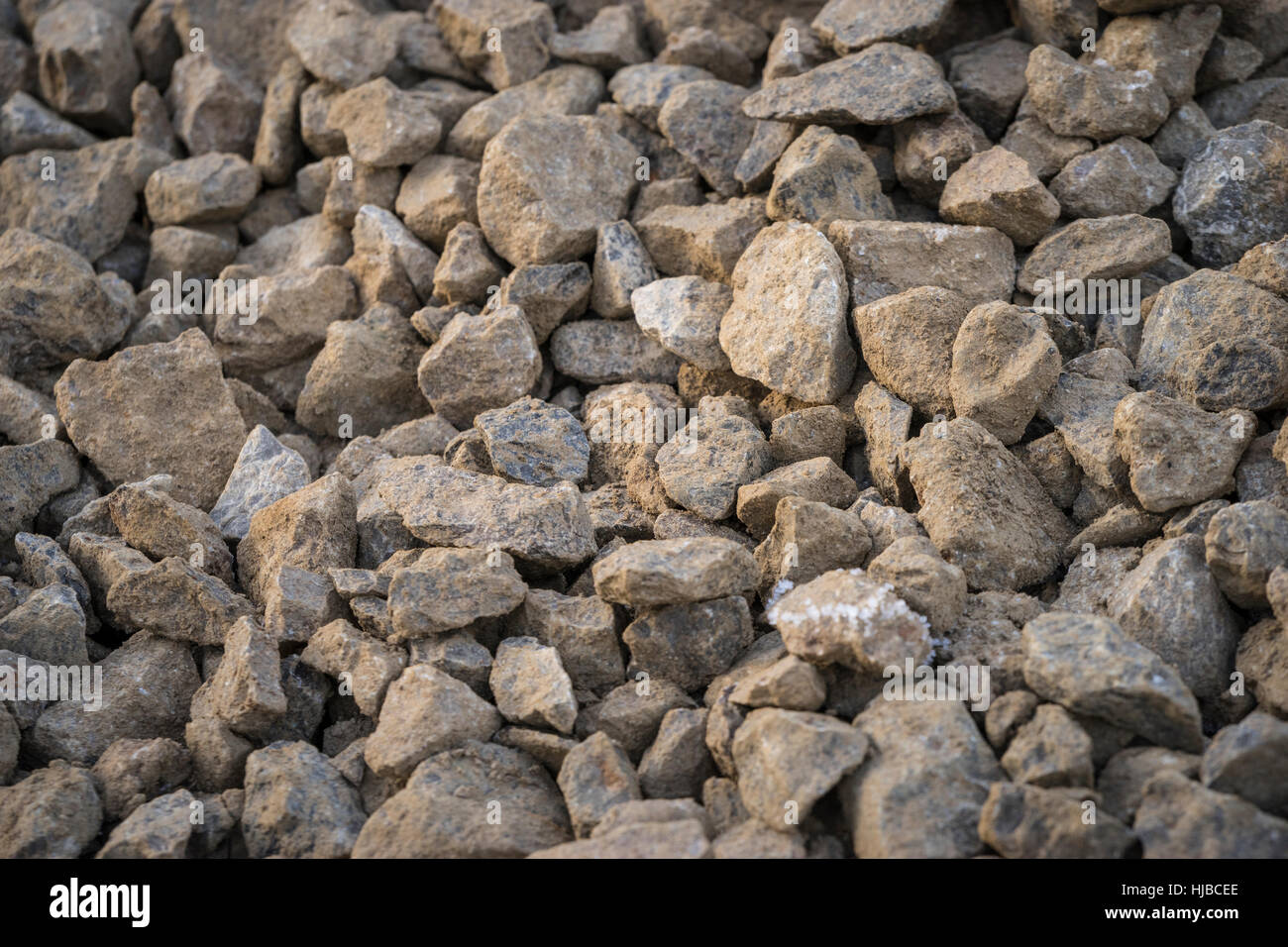 Pebble stones alignment lying on the ground Stock Photo