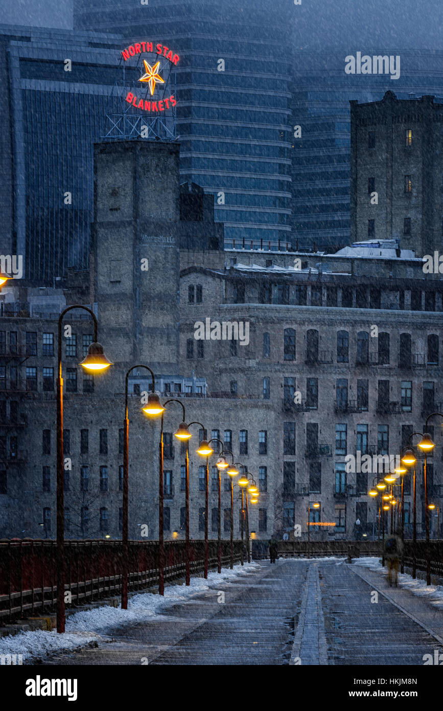 Lighted Stone Arch Bridge walkway in Minneapolis, Minnesota. Stock Photo