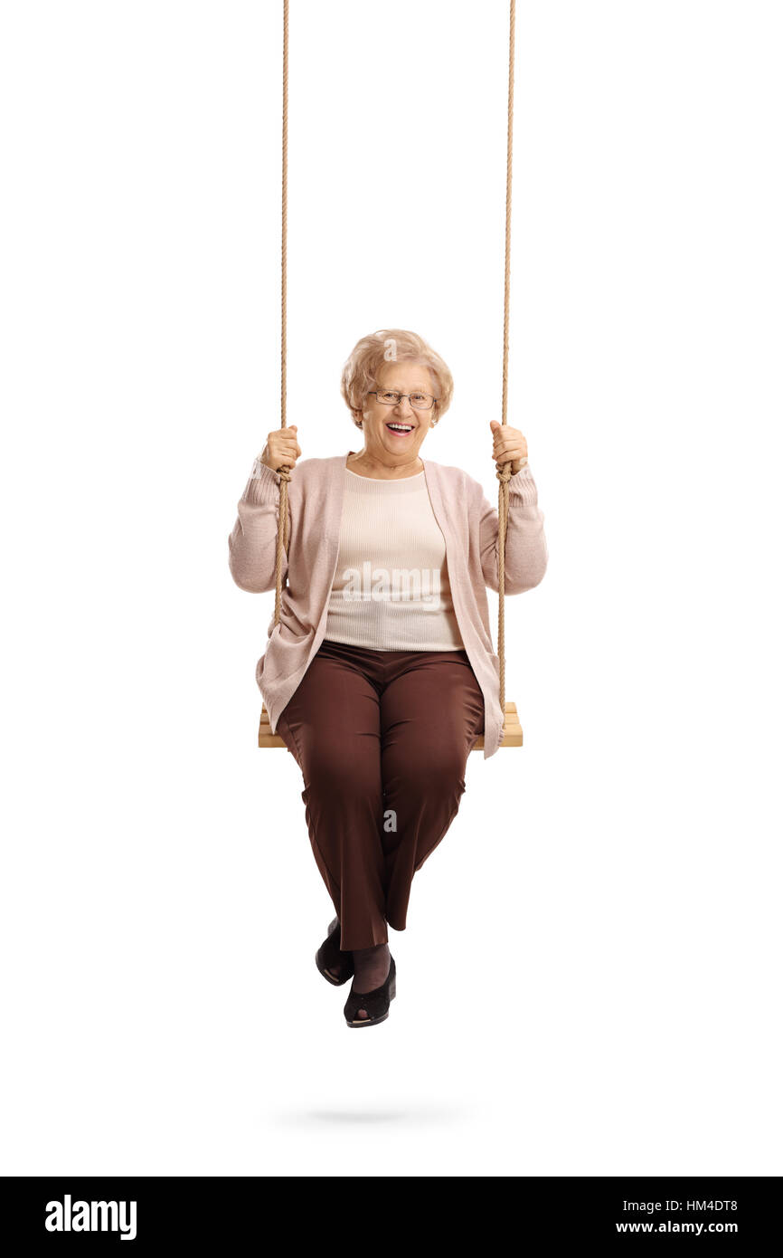 Happy elderly woman on a swing isolated on white background Stock Photo