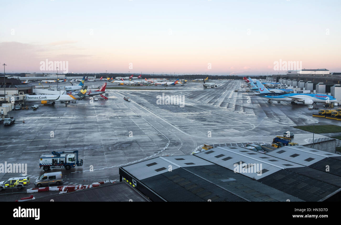 Airplanes on stand outside terminal at Manchester Airport. UK Stock Photo