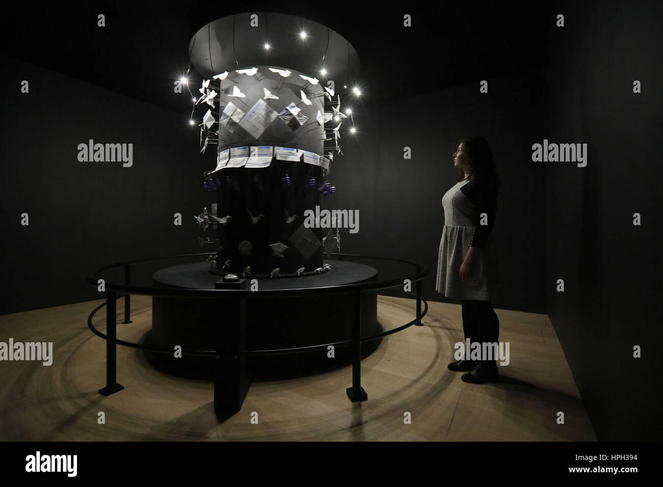 A visitor looking at January 2017 Horoscope by Camille Henrot during the preview of the Wellcome Collection's new Electricity: The spark of life exhibition at the Wellcome Collection in London. Stock Photo