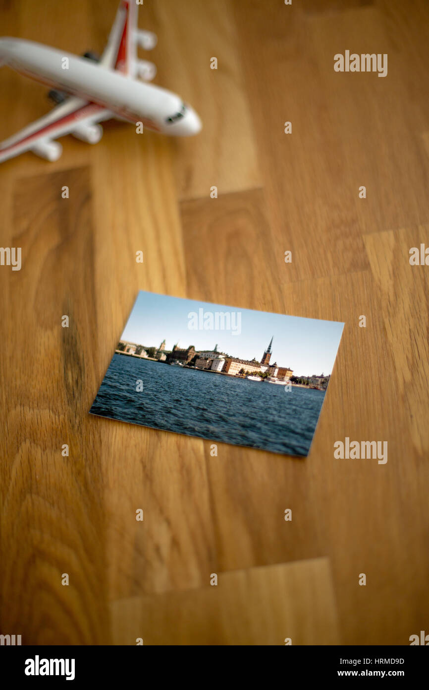 Travel photo of Stockholm, Sweden, lying on wooden table Stock Photo