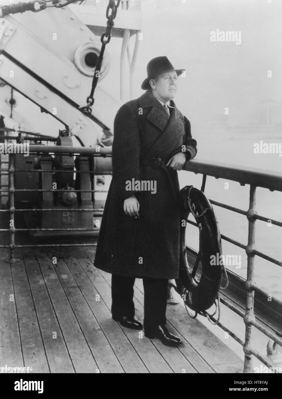 'Charles Laughton, noted Metro-Goldwyn-Mayer star, snapped on his arrival in New York aboard the Bremen...Mr. Laughton is now in Hollywood preparing for his role of Captain Bligh in 'Mutiny on the Bounty.'' Stock Photo