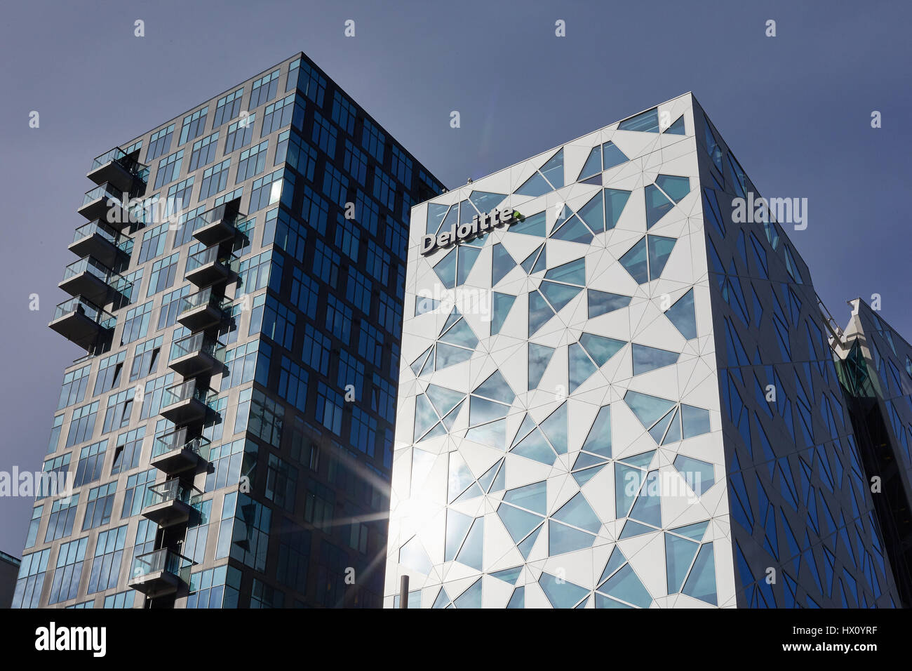 The modern office building Deloitte Headquarter is located at the waterfront at the Bjørvika neighbourhood as part of Oslo’s Fjord City. Stock Photo