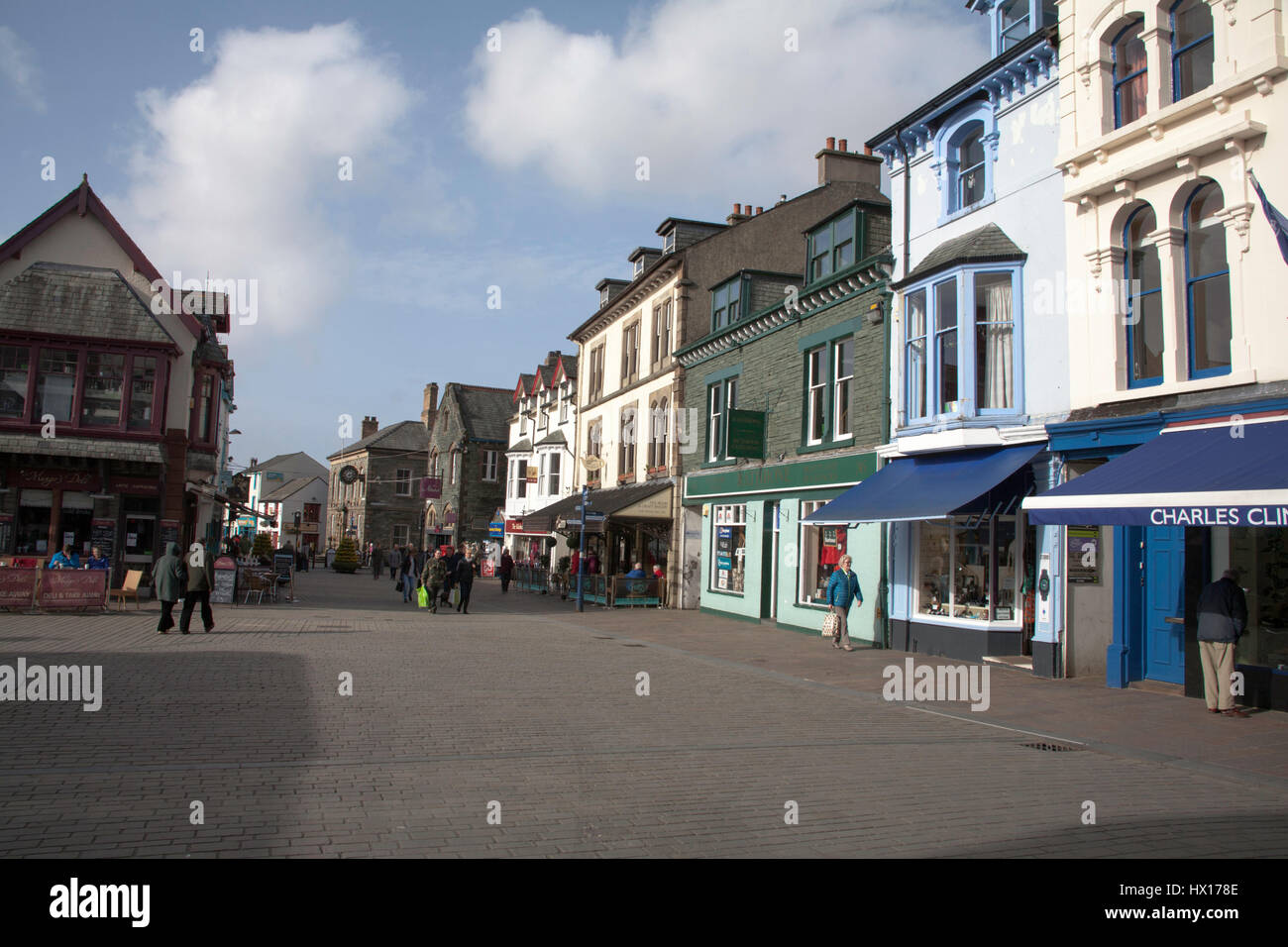 Shops cafes restaurants pubs and tells located along Main Street Keswick  near The Market Place Keswick The Lake District Cumbrai England Stock Photo