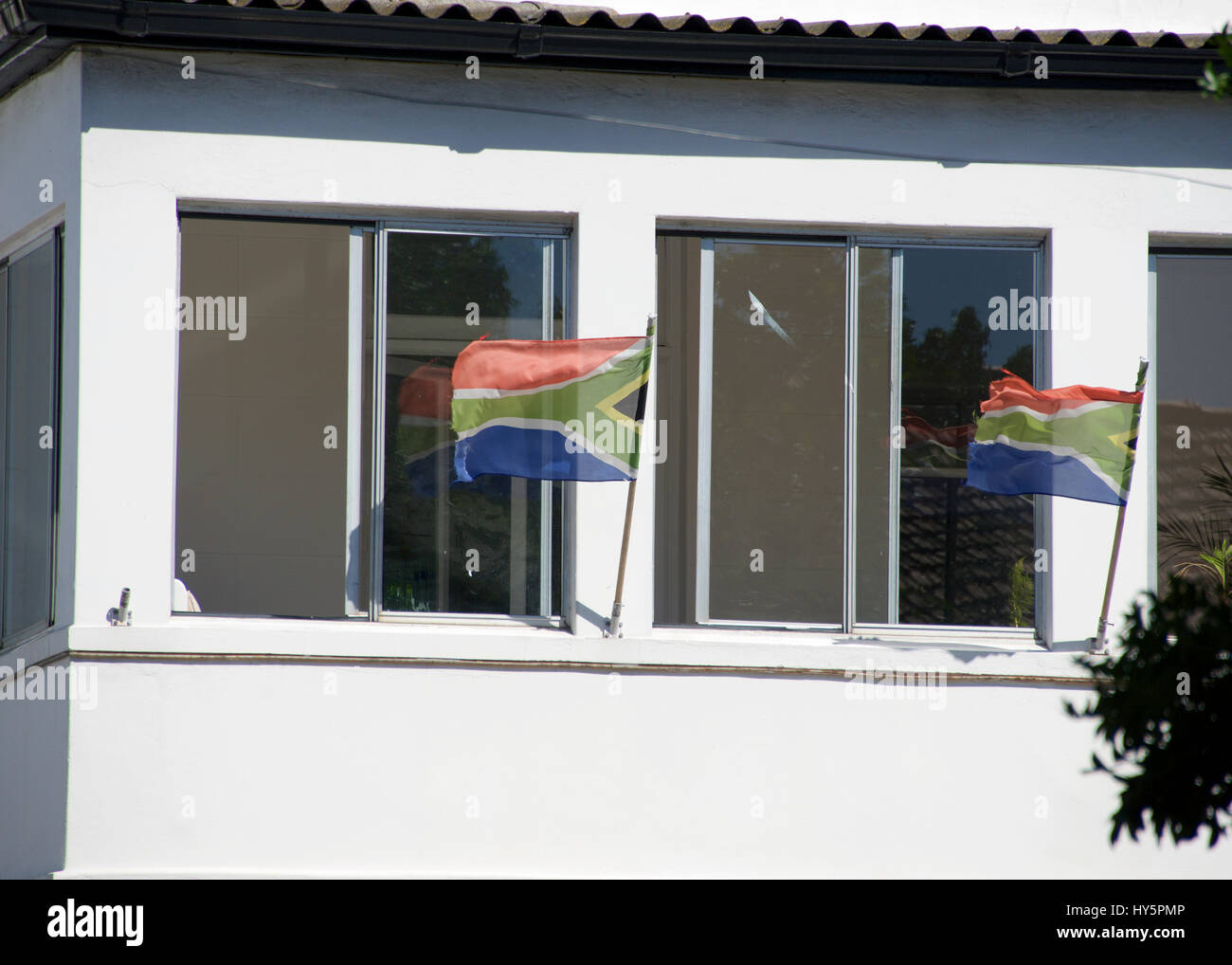 South African Flags flying on a building in Simons Town, Western Cape, South Africa Stock Photo