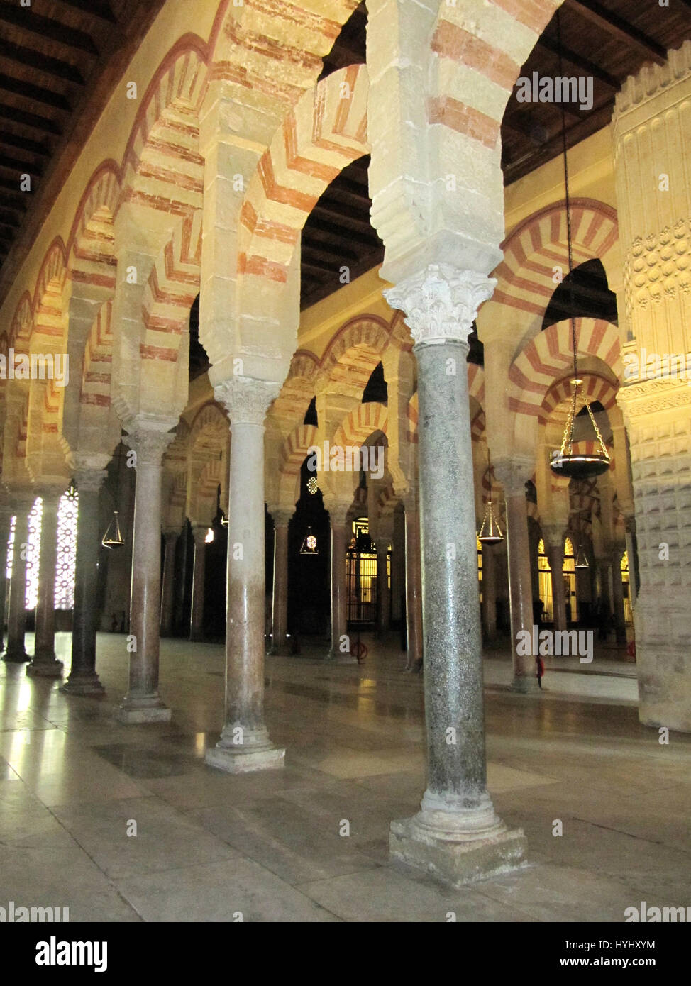 Mezquita.  The Prayer Hall columns of marble and arches of red brick. Cordoba.- Andalusia, Spain.  No people. Full frame. UNESCO World Heritage Site. Stock Photo