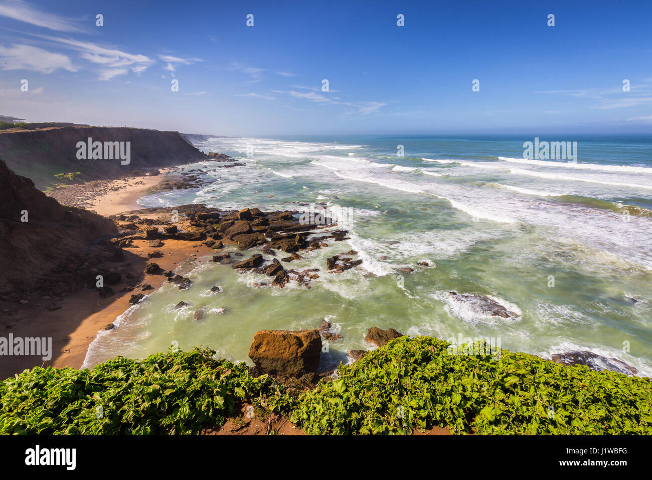 Stormy Atlantic under the cliffs on coast near Rabat-Sale, Morocco Stock Photo