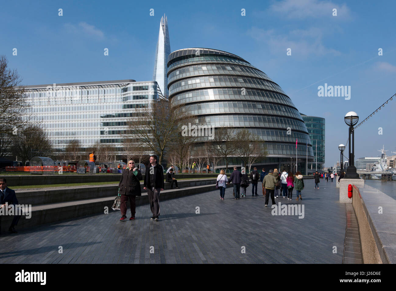 The City Hall glass-clad building by architect Norman Foster with The Shard skyscraper in the background, London, England, UK, Europe Stock Photo