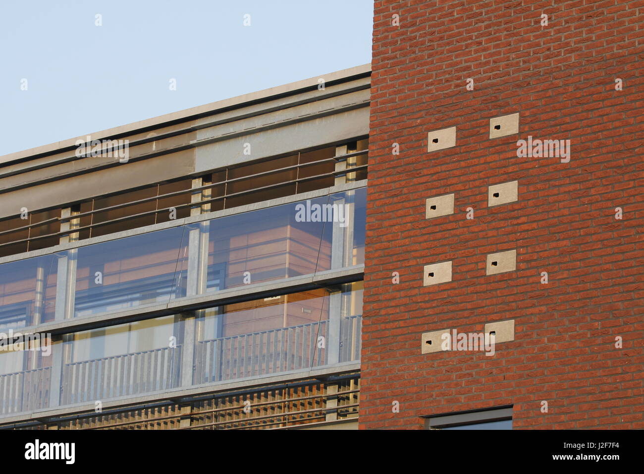 Nest boxes for the common swift get a prominent place in a new appartment building Stock Photo