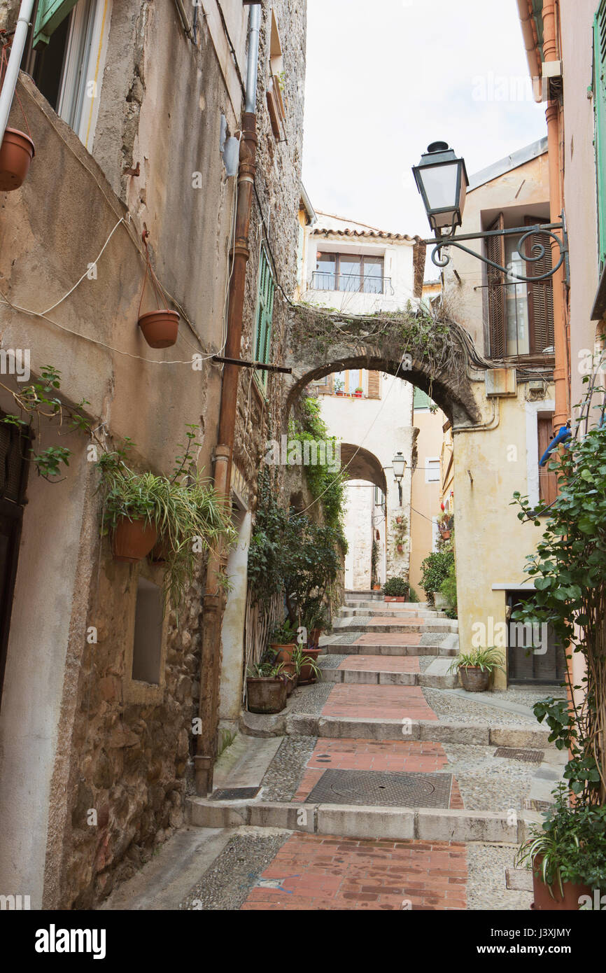 Steps in alley between buildings, Menton, France Stock Photo