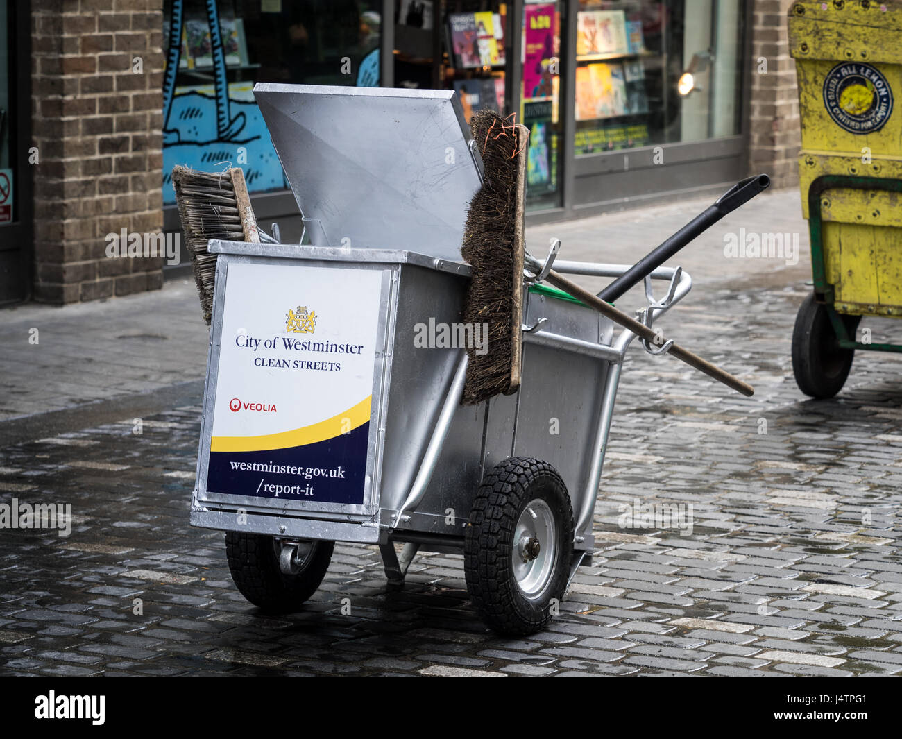 A street Cleaning cart belonging to Westminster council in central London Stock Photo