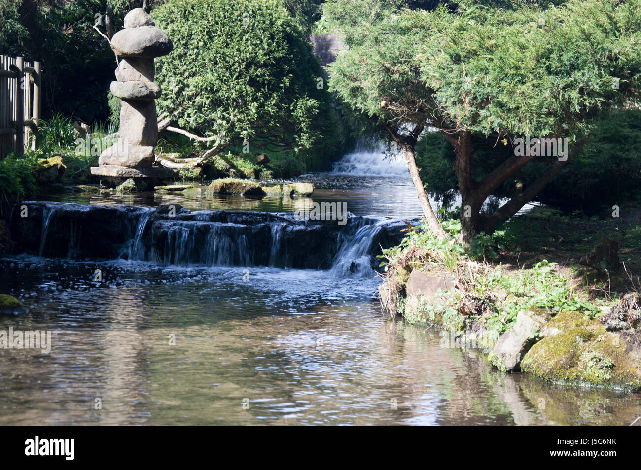 A man made waterfall in the gardens at Newstead Abbey, Nottinghamshire Stock Photo