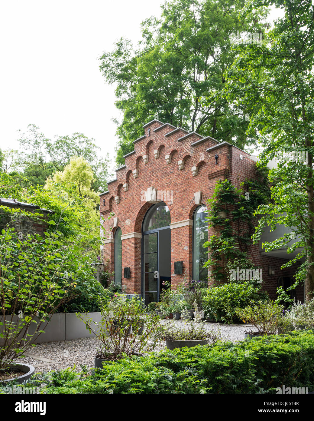 Triple-height brick facade of Isabelle de Borchgrave's Brussels atelier Stock Photo