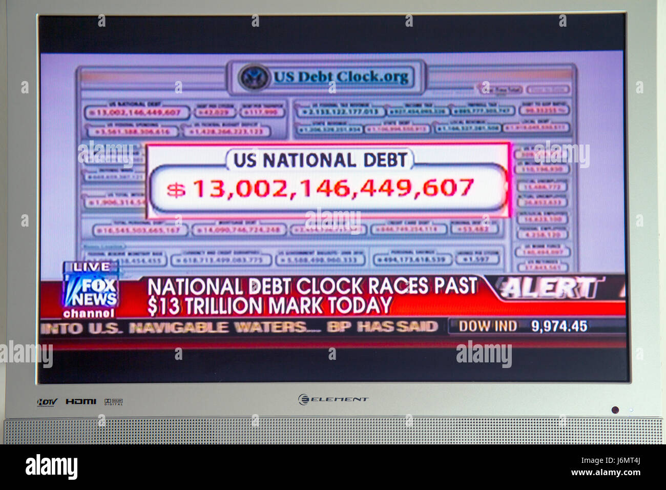 Miami Beach Florida,Fox News,national debt clock,financial crisis,borrowing,TV,television,set,screen,flat panel,cable,channel,media,broadcast,visitors Stock Photo