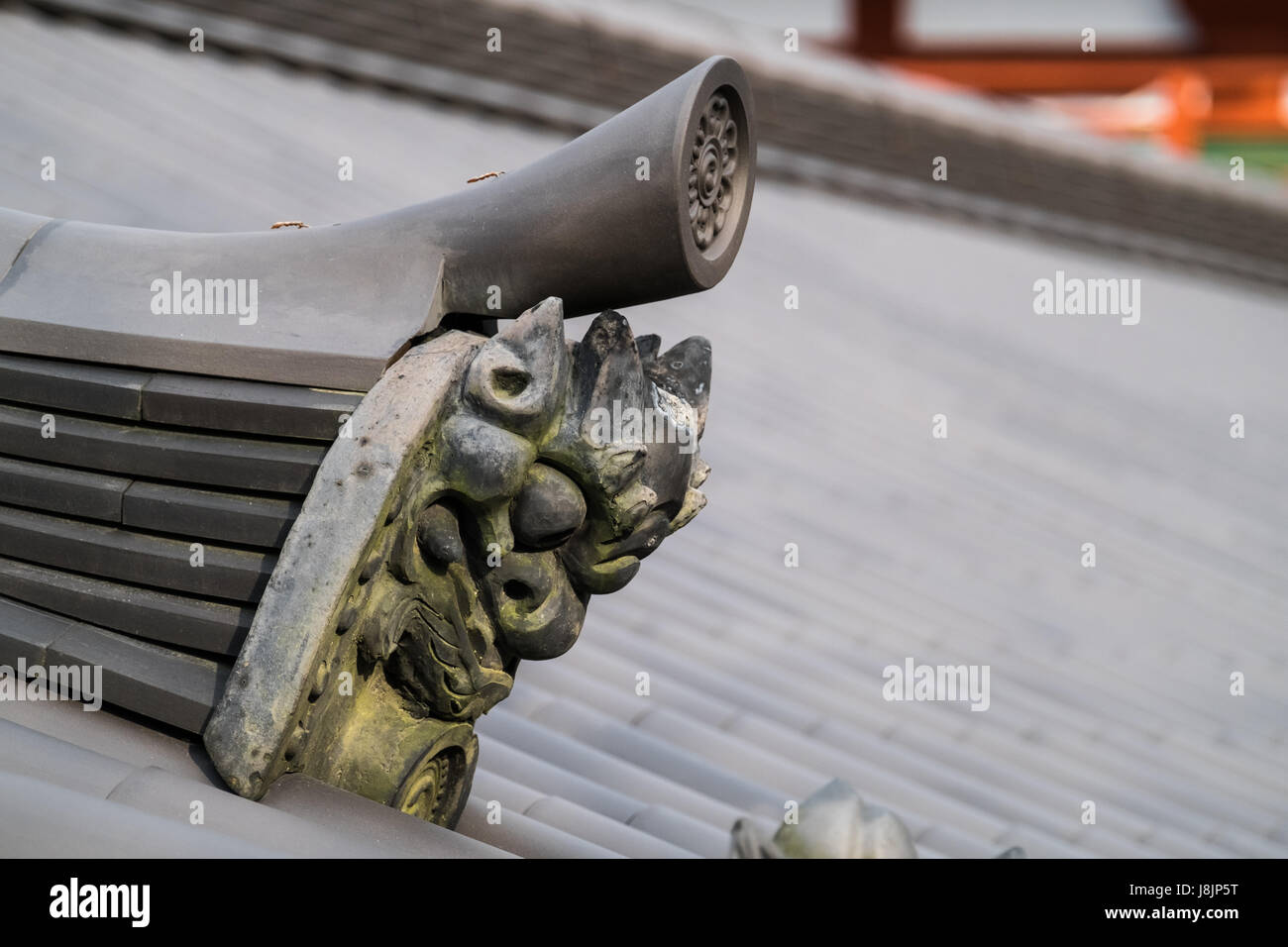 Traditional Japanese architecture and rooftop gargoyles. Stock Photo