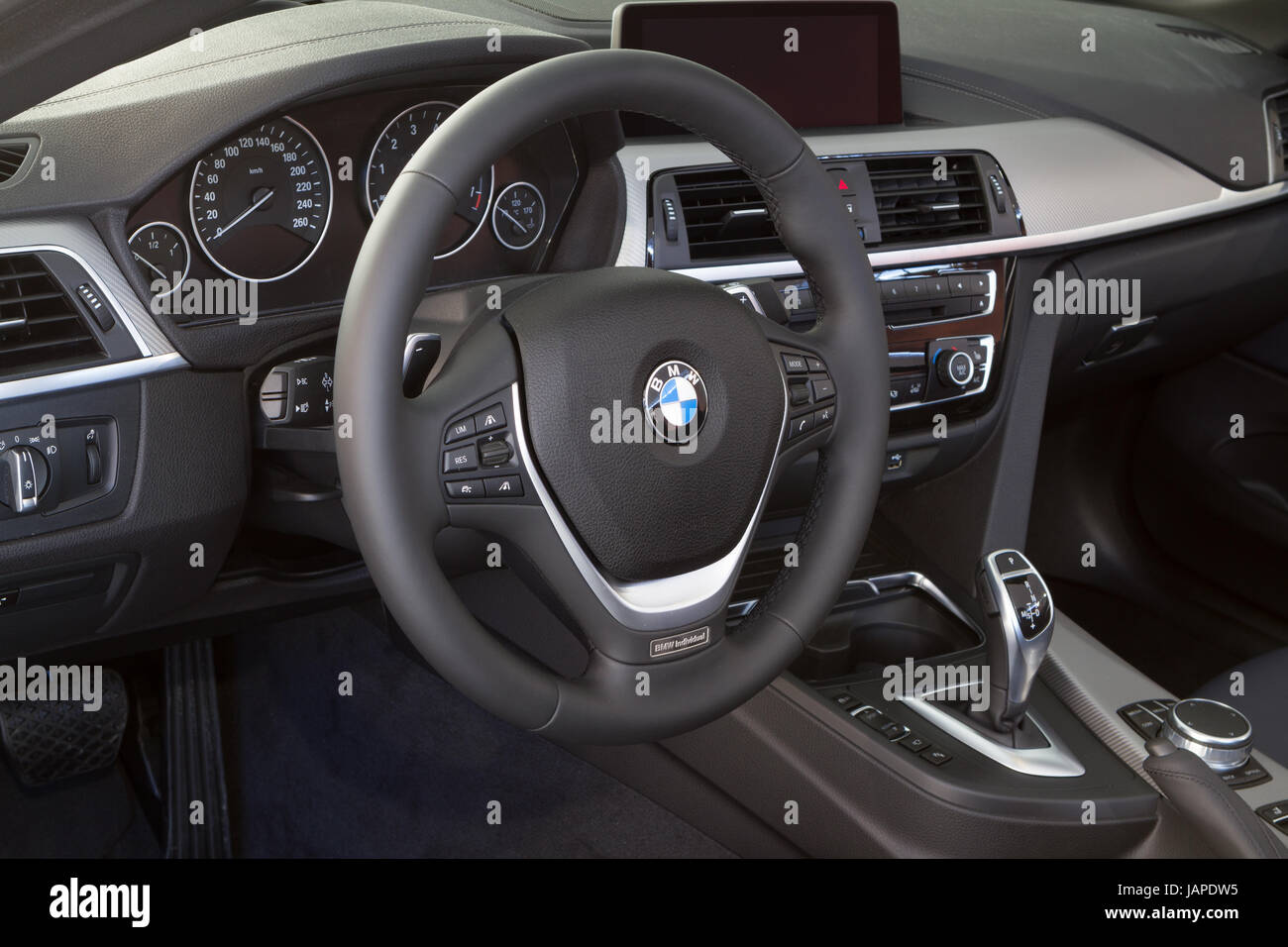 Turin, Italy, 7th June 2017. Interior view and dashboard of BMW 4 Series Cabrio. Third edition of Parco Valentino car show hosts cars by many automobile manufacturers and car designers inside Valentino Park in Torino, Italy. Stock Photo