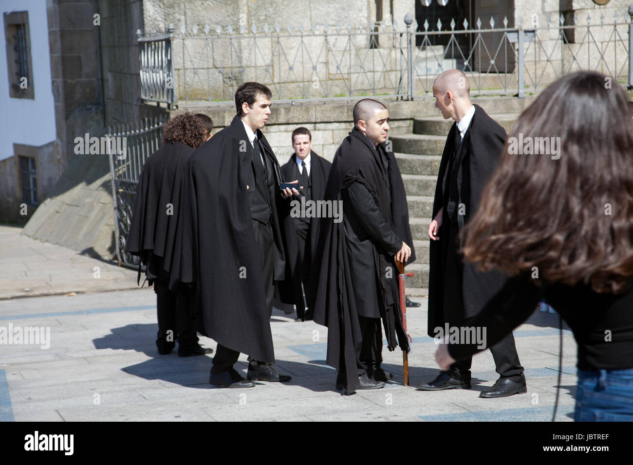 University Students with Black Capes on Rua dos Clerigos in Porto - Portugal Stock Photo