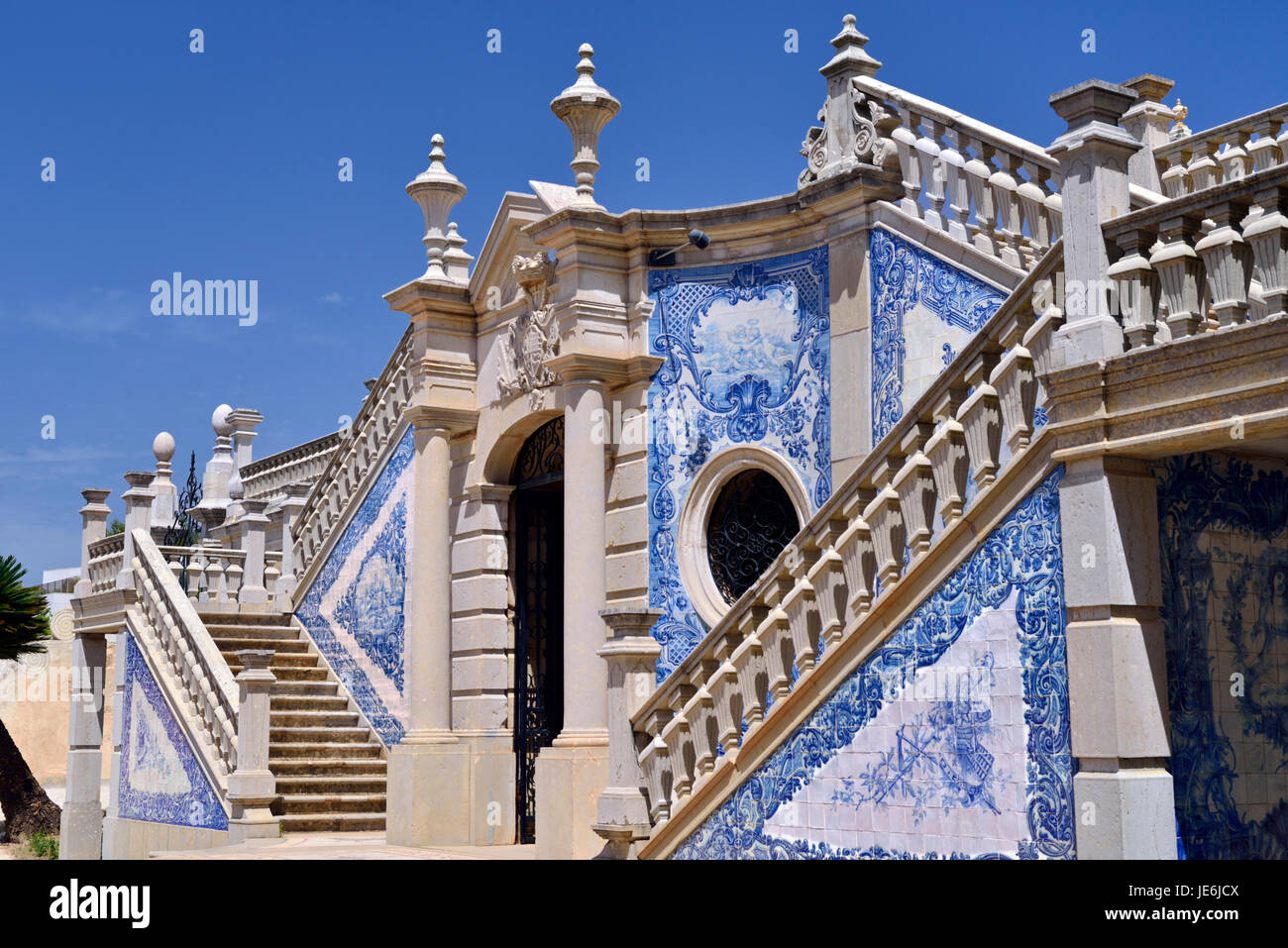 Portugal: Blue and white tiles as decoration on baroque staircase at Estoi Palace Stock Photo