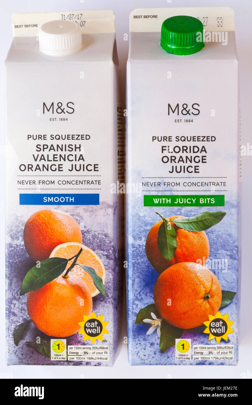 Cartons of M&S Pure squeezed Spanish Valencia Orange Juice smooth and Pure squeezed Florida Orange Juice with juicy bits isolated on white background Stock Photo