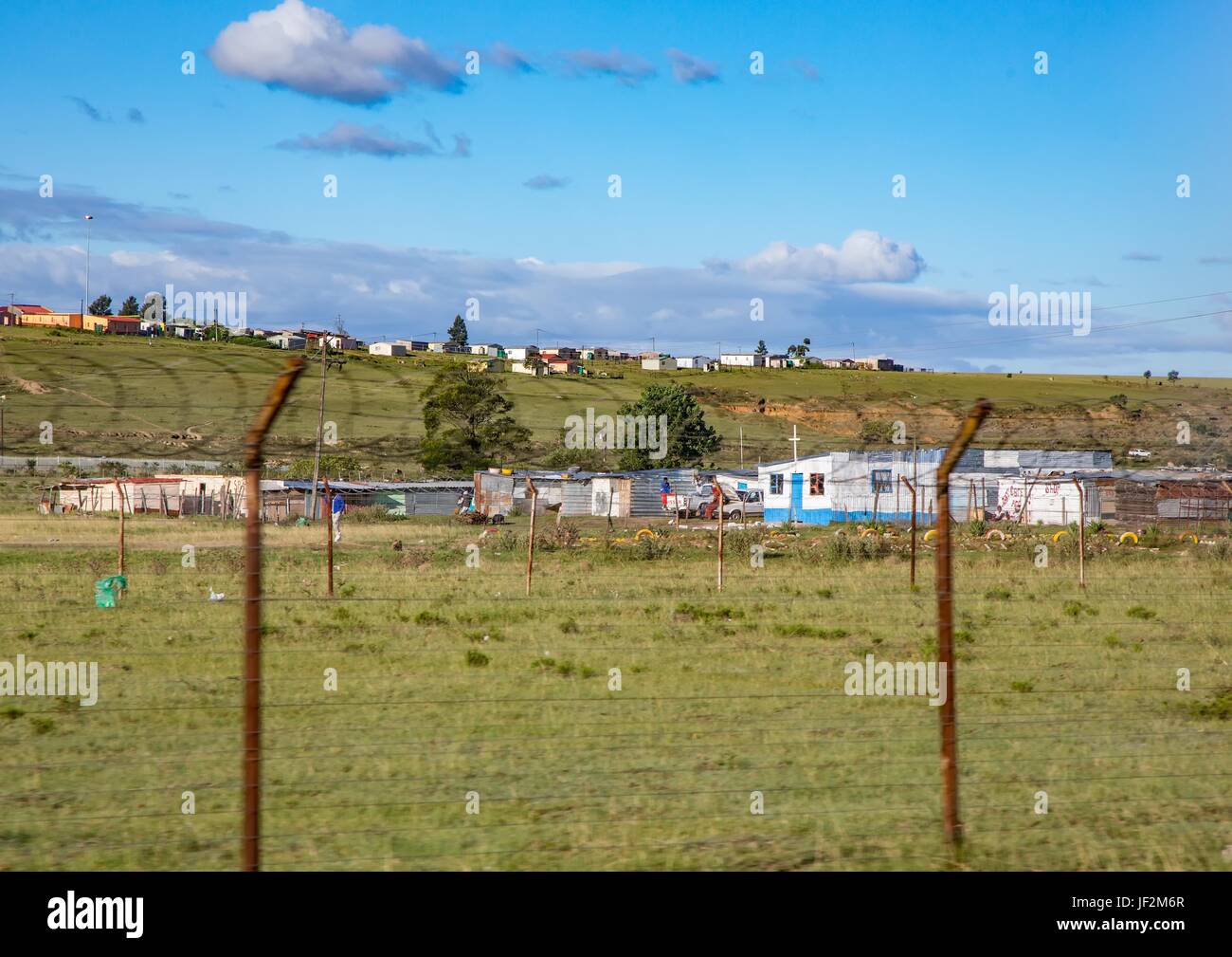 Houses and huts in the Eastern Cape of South Africa during summertime Stock Photo