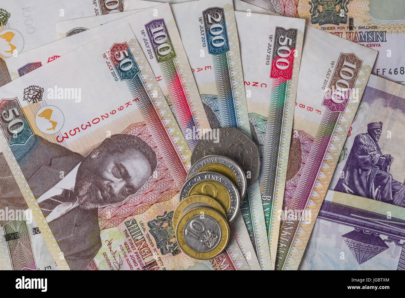 Kenyan Shilling Bank Notes And Coins In Various Denominations Stock Photo