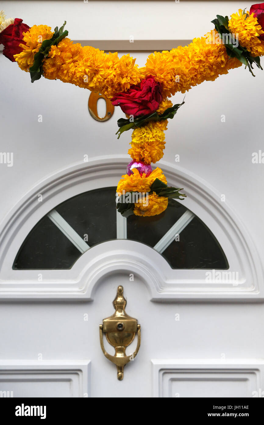 Hindu garland on a house door in Leicester, U.K. United kingdom. Stock Photo