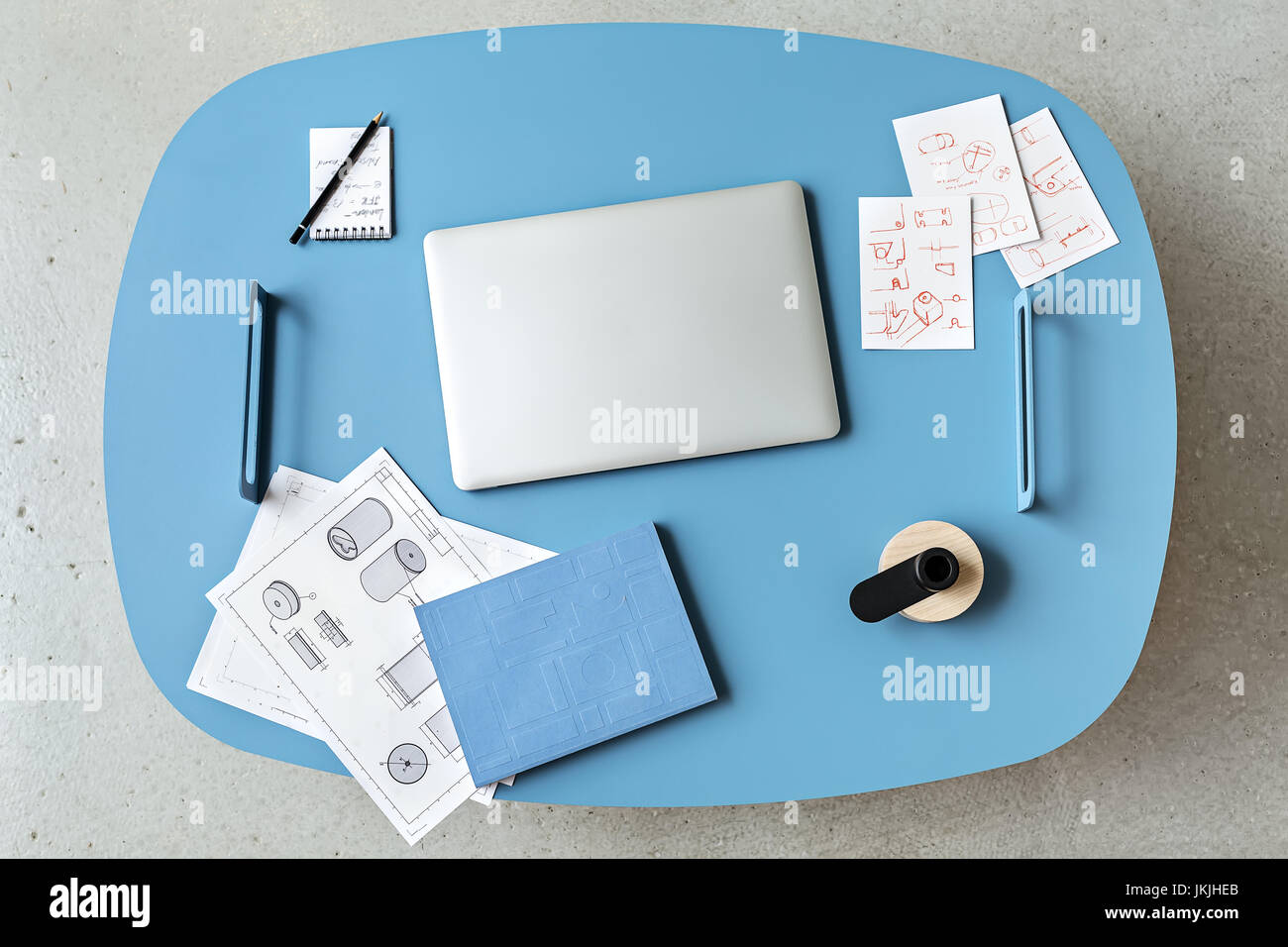 Blue table with laptop Stock Photo