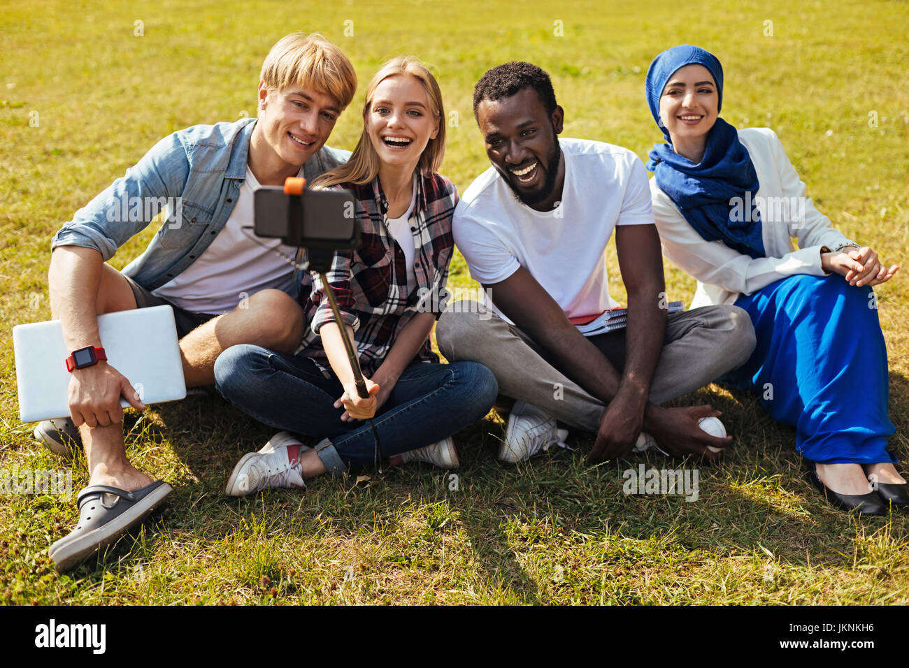 Beautiful confident people posing for a selfie Stock Photo