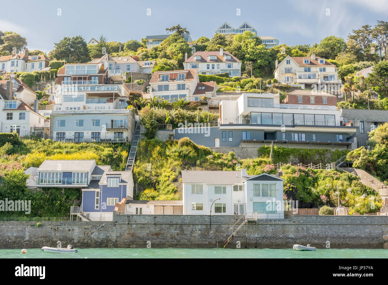 Waterfront properties overlooking Salcombe Harbour in south Devon, UK. Stock Photo