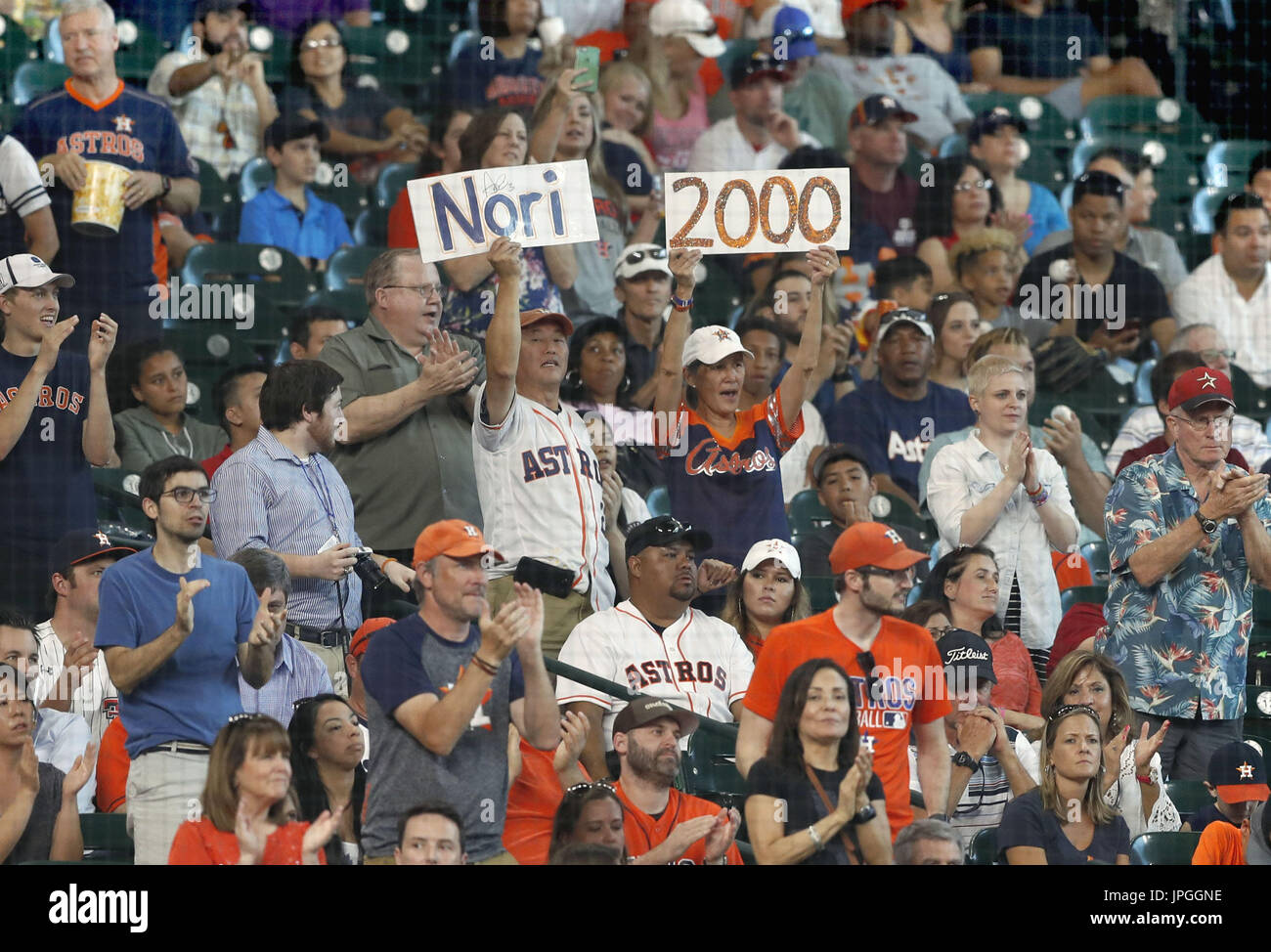 Houston Astros fans celebrate outfielder Norichika Aoki as he hit a ...