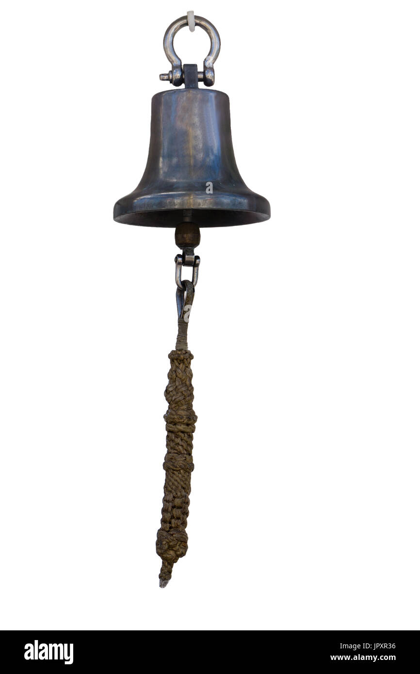 old vintage metal ship's bell with a rope on a white background Stock Photo