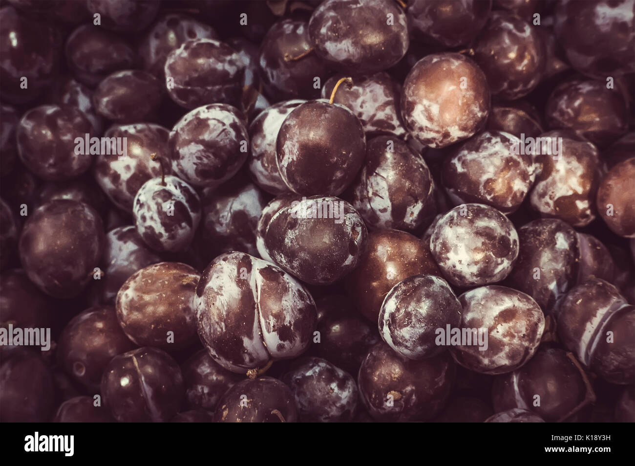 Beautiful and delicious salted dried Chinese plum. apricot for background, backdrop, or wallpaper. The counter of the store. Stock Photo