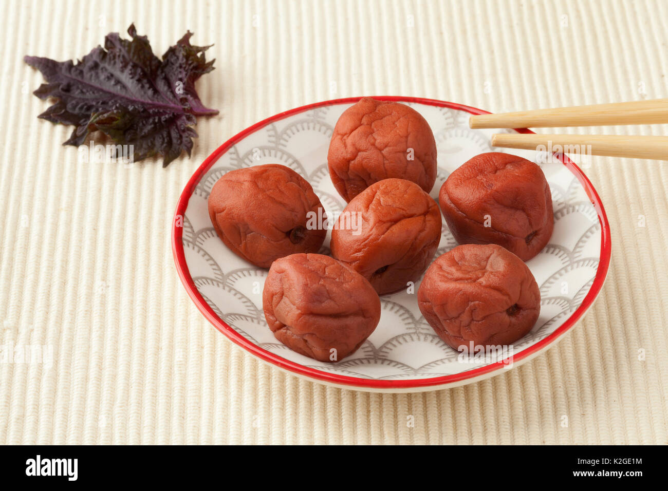 Dish with japanese umeboshi and shiso leaf Stock Photo