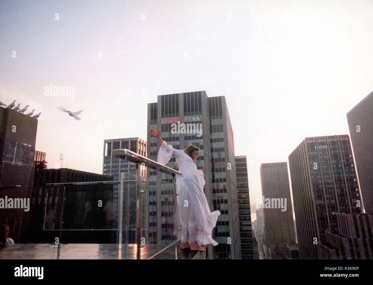 EXORCIST II: THE HERETIC LINDA BLAIR on the ledge     Date: 1977 Stock Photo