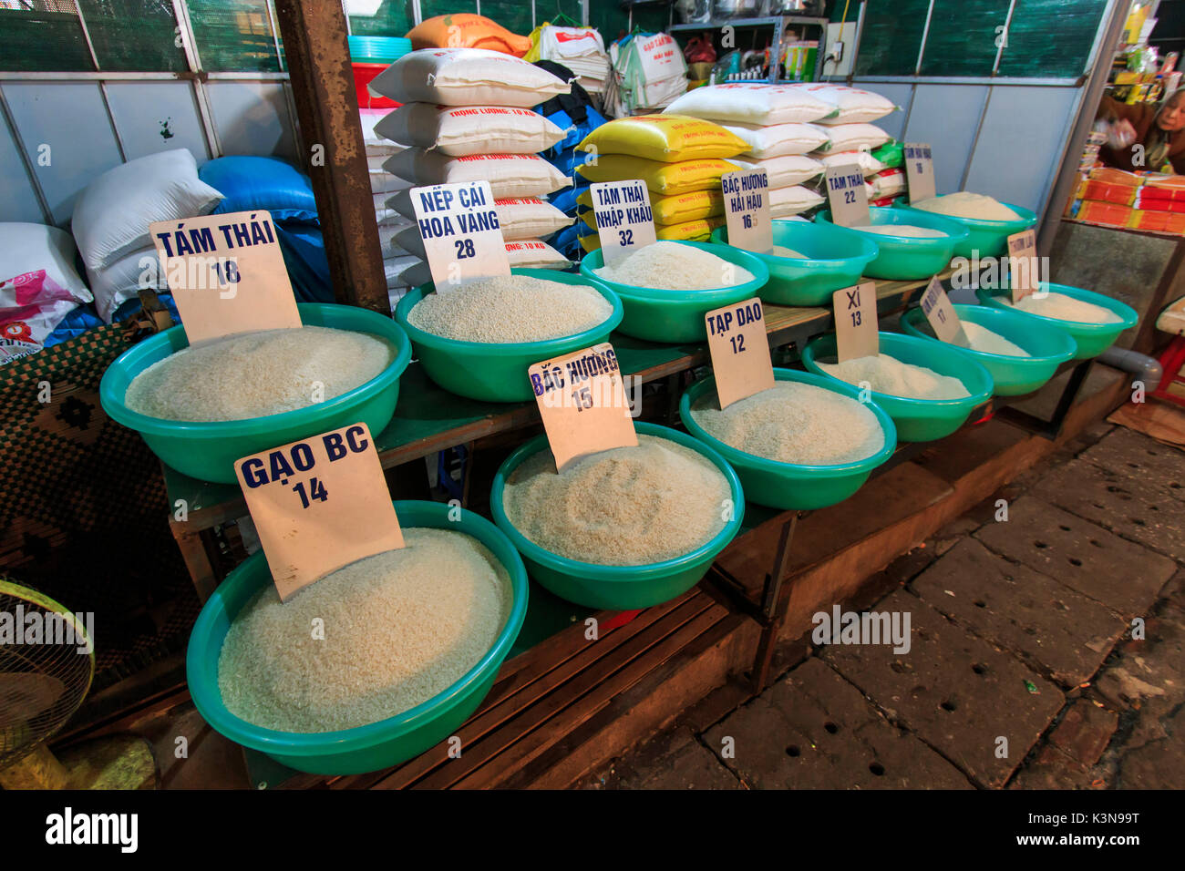 Different varieties of rice for sale on a local market in Hanoi, Vietnam Stock Photo